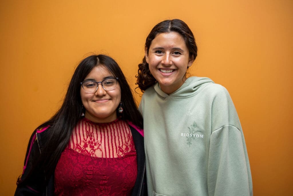 Sarah and Rori pose together at New Pathways for Youth, highlighting a positive mentor-mentee relationship.